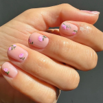 Nail Art Trends to Obsess Over: From Christmas Stickers to Elegant Florals
